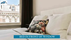 bed in front of window